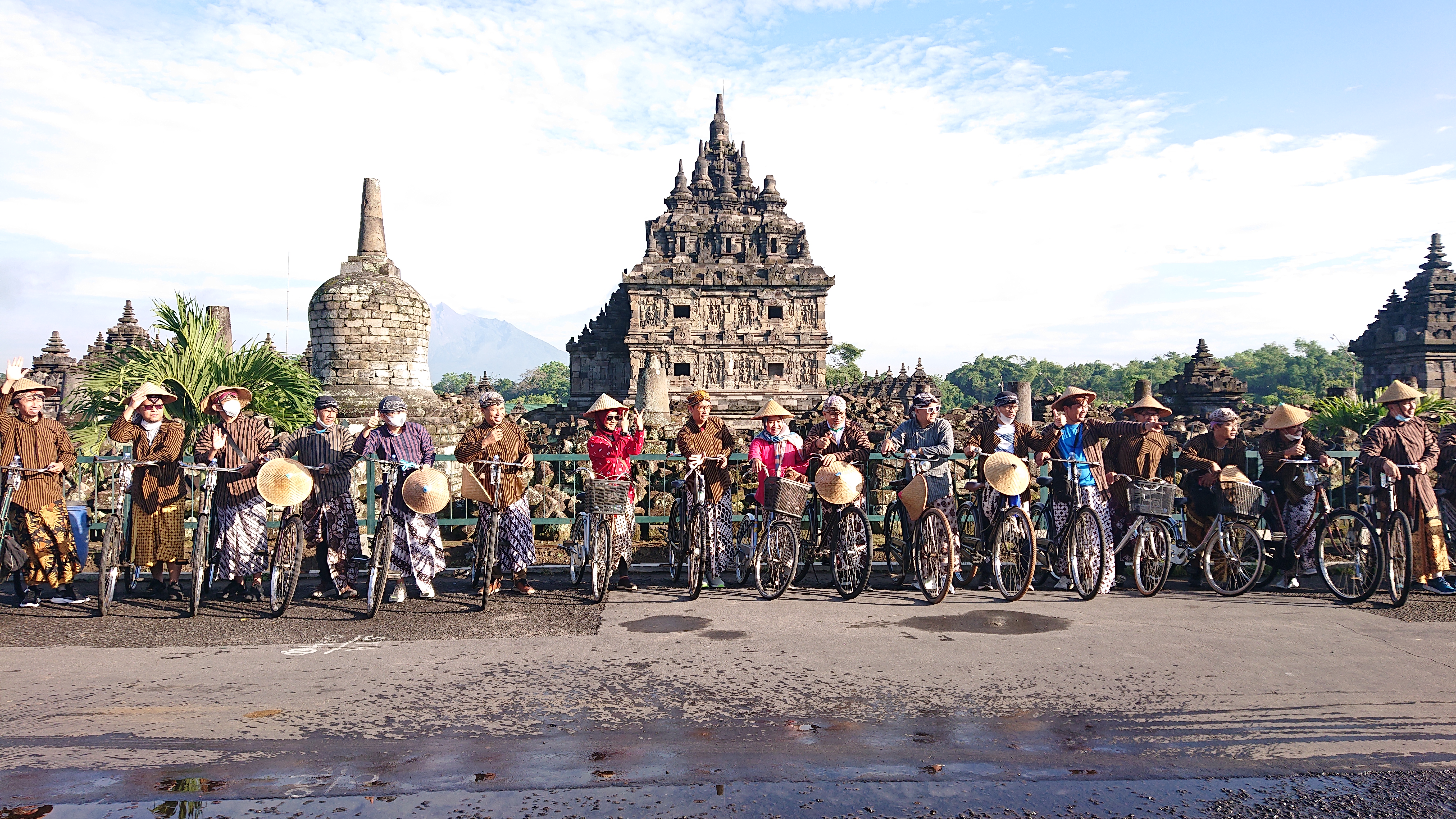 Two models wearing women's black cotton crewneck tee and off-white cotton crewneck tee.